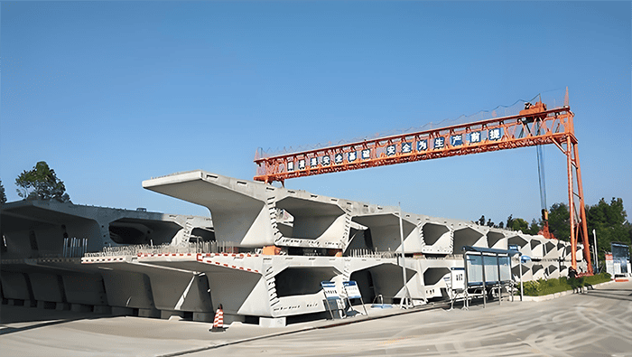 Scheme for the UWB Positioning and Management System in the Segmental Beam Storage Area of the Beam Fabrication Plant